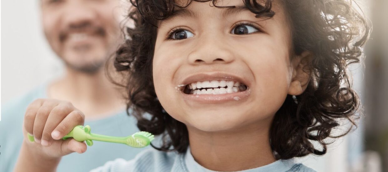 Child brushing teeth
