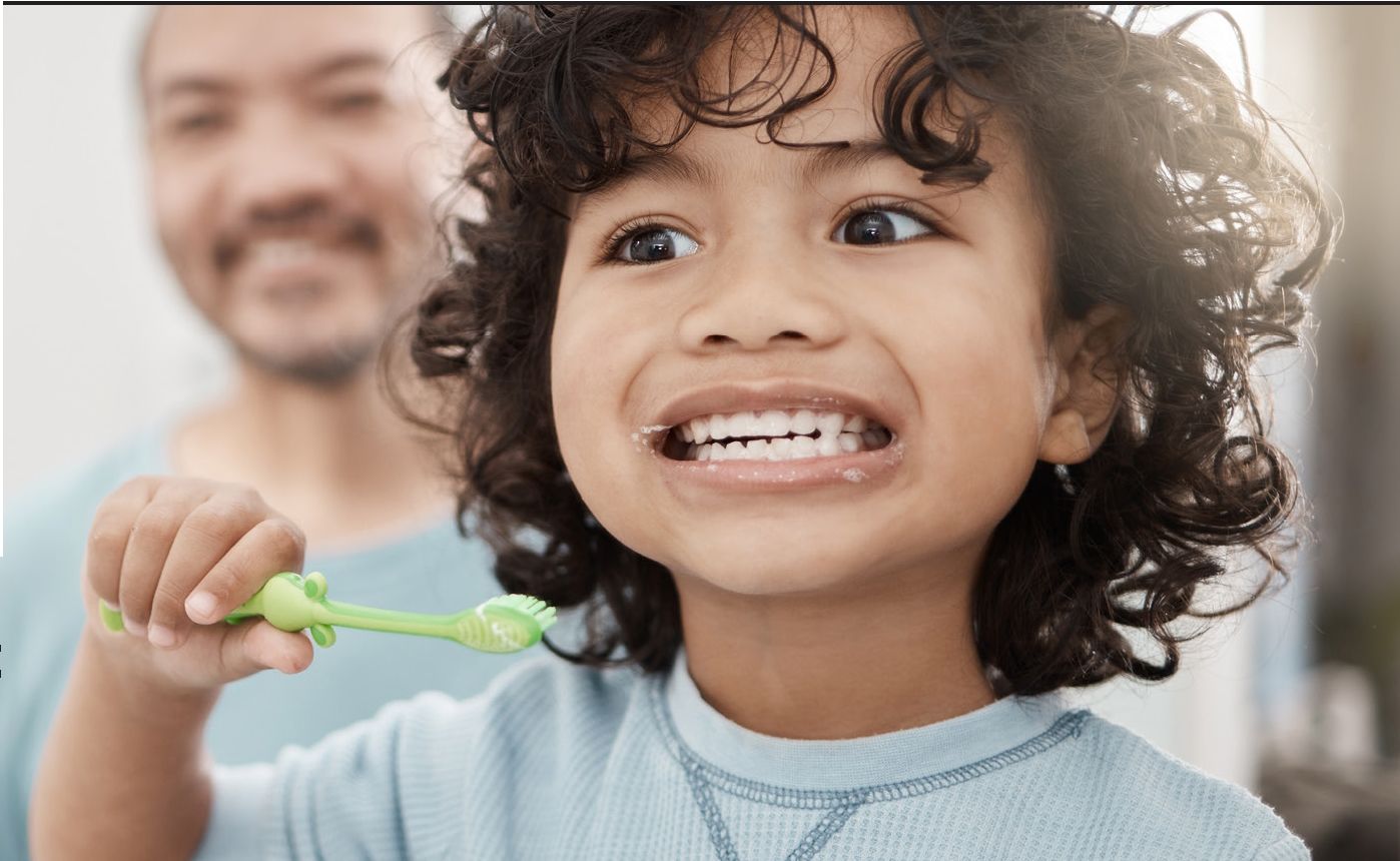 Child brushing teeth