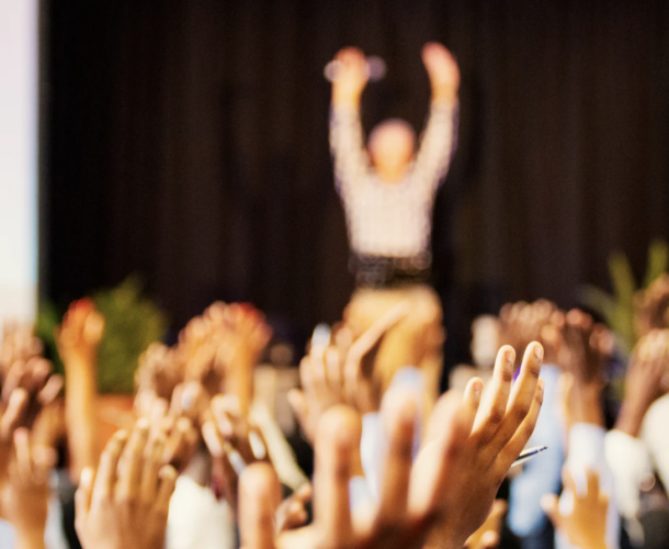 abstract photo of people attending conference