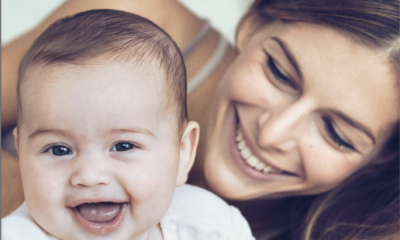 mother and baby smiling